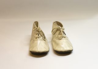 We Can Do It. War’s Other Voices Pait of baby utility boots, date unknown