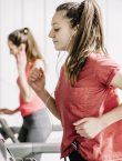 Youth gym, girl on a treadmill