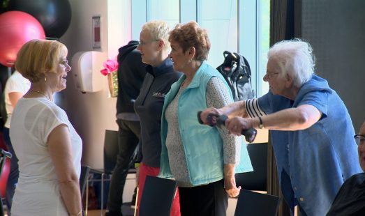 Older adults taking part in gentle exercise classes